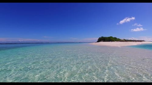 Aerial drone shot scenery of relaxing lagoon beach lifestyle by blue ocean and white sand background