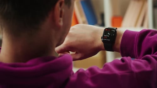 Smartwatch Showing Heart Rate on Person's Wrist