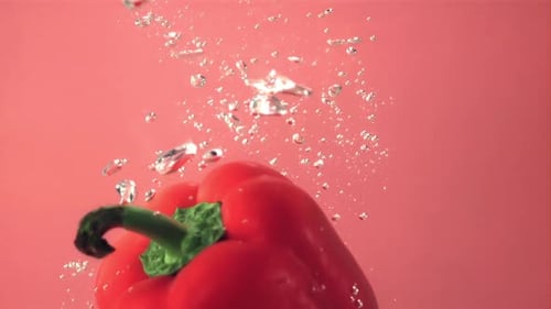 Red Pepper Submerged in Water Bubbles