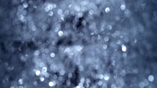 Blue bokeh texture with defocused lights