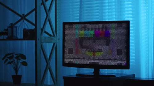 Vintage TV with No Signal Test Pattern at Night
