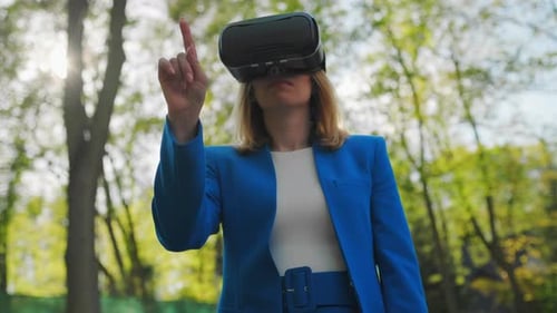 Woman Using VR Headset Outdoors