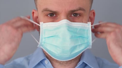 Adult Wearing a Medical Face Mask