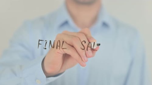Hand Writing 'Final Sale' On Transparent Surface