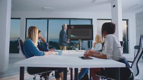 Business Presentation in Modern Office Setting