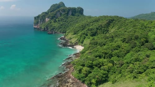 Summer Afternoon Drone Shot of Koh Phi Phi Beach Island with Lush Cliffside
