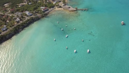 Aerial drone view of a fishing motor boat in the Bahamas, Caribbean.