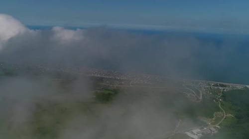 Over The Clouds And Vast Sea Aerial View