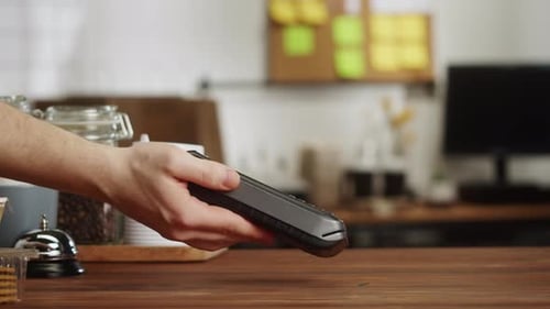 Paying with Credit Bank Card in Cafe