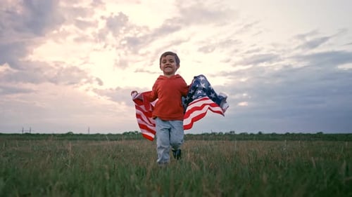 Child Runs with American Flag in Golden Field