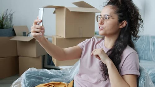 Woman on Video Call in New Home