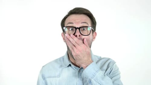 Shocked Man Wearing Glasses Reacts with Surprise