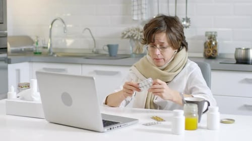 Adult Woman Consulting Doctor Online While Sick