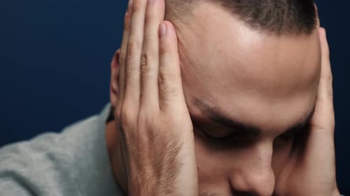 Depressed Desperate Man Feeling Worried . Stressed Businessman Looking Frustrated Sitting at Home