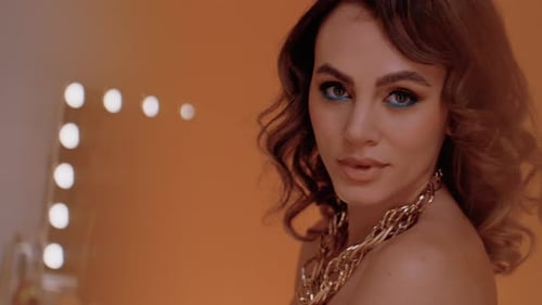 Beautiful Woman in Makeup Posing for Camera