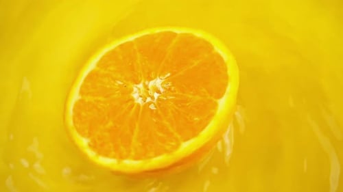 Rotating segments of a ripe and juicy orange on an orange background. Slow motion.