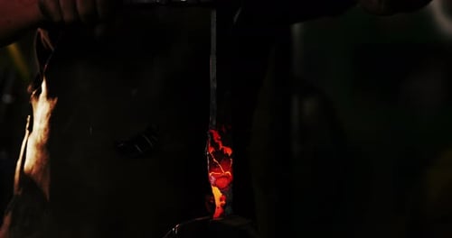 Glowing Molten Metal Being Forged