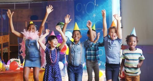 Enthusiastic Children Celebrate Birthday with Joyful Energy