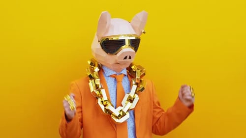 Person in Pig Mask Dancing in Orange Suit