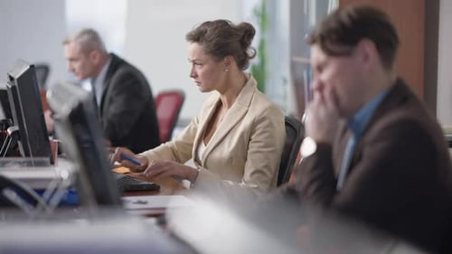Busy Hurrying Woman Working in Office with Blurred Men