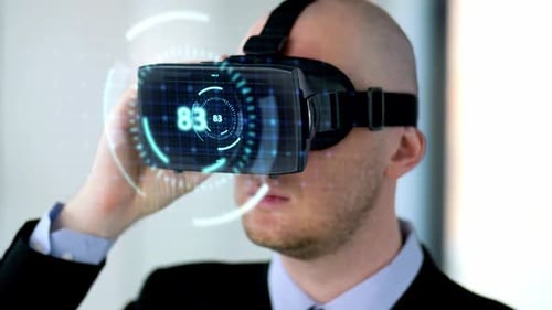 Man Wearing VR Headset Displays Futuristic Graphics