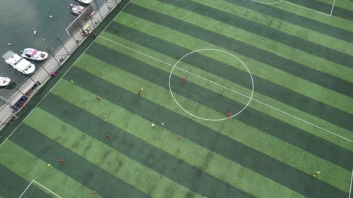 Aerial View of Soccer Game in Urban Setting