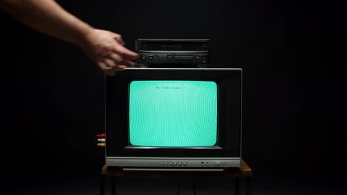 Old Retro Square Television with Blue Screen on Black Background
