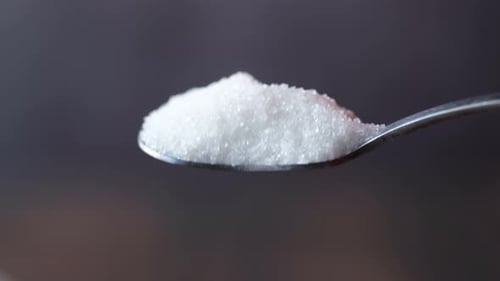 White Sugar on a Sliver Spoon