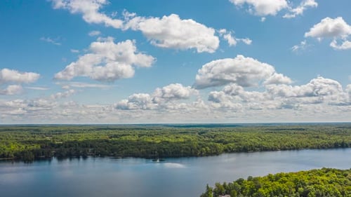 Aerial Time Lapse Of Beautiful Summer Lake And Islands With Clouds Moving Fast 02
