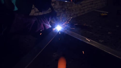 Welder Joins Metal Parts with Bright Sparks
