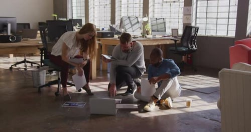 Young creative professionals working in a modern office