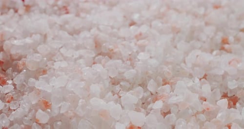 Pink Himalayan Salt Crystals on Wooden Surface