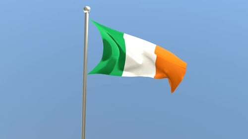 Irish Flag Waving Against a Clear Blue Sky