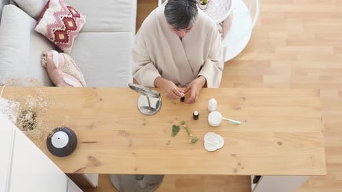 Woman Giving Herself a Home Manicure