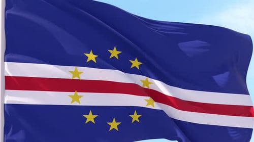 Waving Cape Verde Flag Against Blue Sky