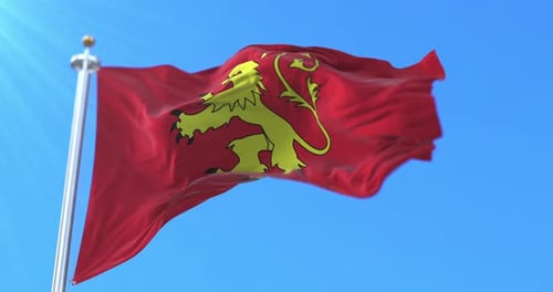 Red Flag with Golden Lion Crest Waving in Blue Sky