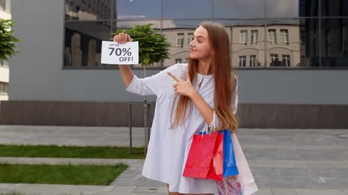 Smiling Girl Showing Up To 70 Percent Off Inscriptions Signs, Rejoicing Good Discounts, Low Prices