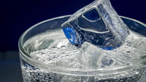 Refreshing Beverage with Ice Cubes in a Glass