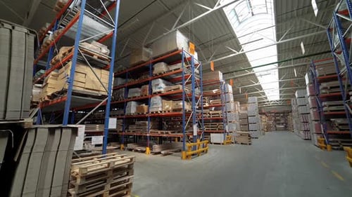 View of the storage with parquet at the factory from the inside. Business.