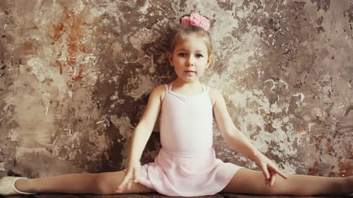 Little Ballerina Sitting in the Splits Position