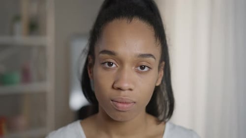 Young Woman Portrait Close-Up Looking at Camera