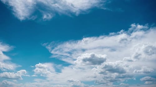 Timelapse of Fluffy Clouds Moving in the Blue Sky Cloud Space