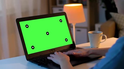 Hands Typing on Laptop with Green Screen at Home 9