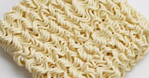 Close Up of Uncooked Block of Ramen Noodles
