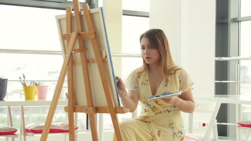 Art, Creativity, Hobby, Job and Creative Occupation Concept. Young Cute Girl Draws in Art Workshop