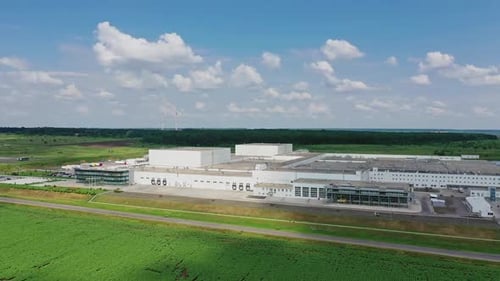 Industrial zone on suburb. Aerial view of the modern factory