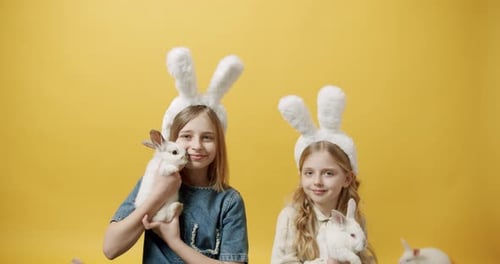 Girls with Rabbits and Bunny Ears Smiling