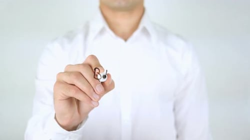 Man Writes 'Best Practice' on Clear Surface