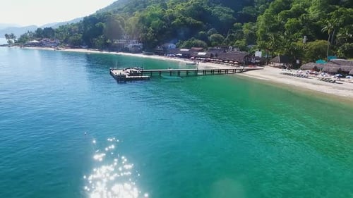 Tropical Beach Pier on Turquoise Water