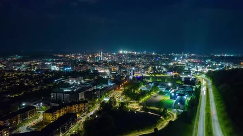 Night view of the city from the air time lapse